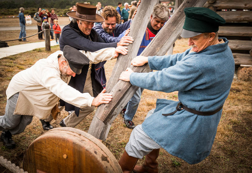 Volunteers working to turn the windmill at Fort Ross State Historic Park