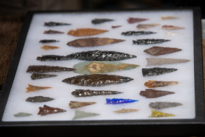 Collection of handmade arrowheads at Fort Ross Festival