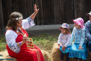 Storyteller in traditional Russian attire 